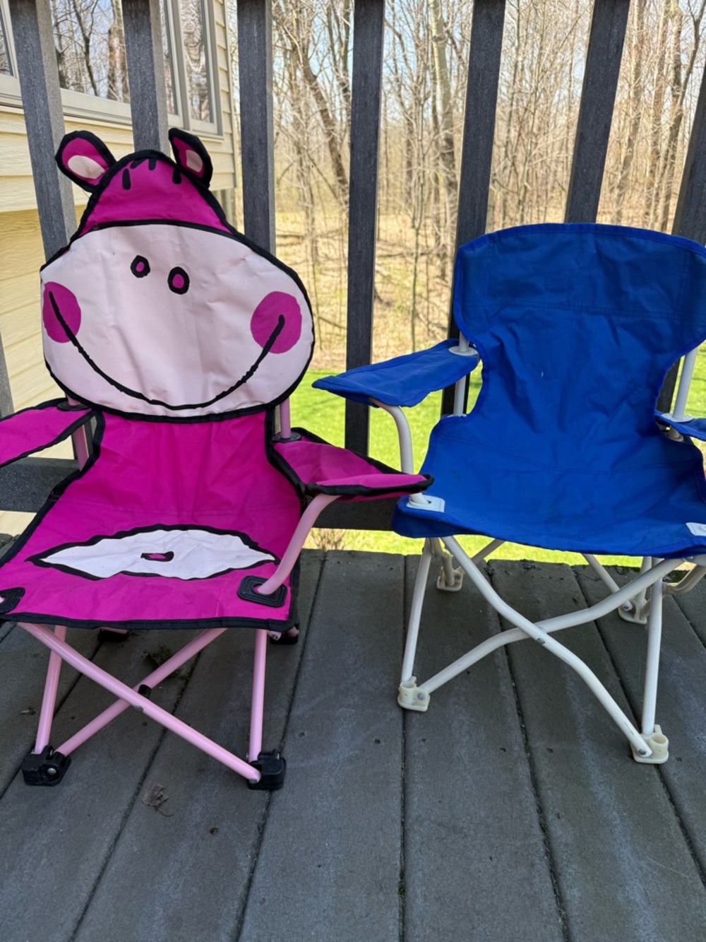 Kid size Pink Hippo Chair and a blue Ozark Trail Basic Quad Folding Camp Chair
